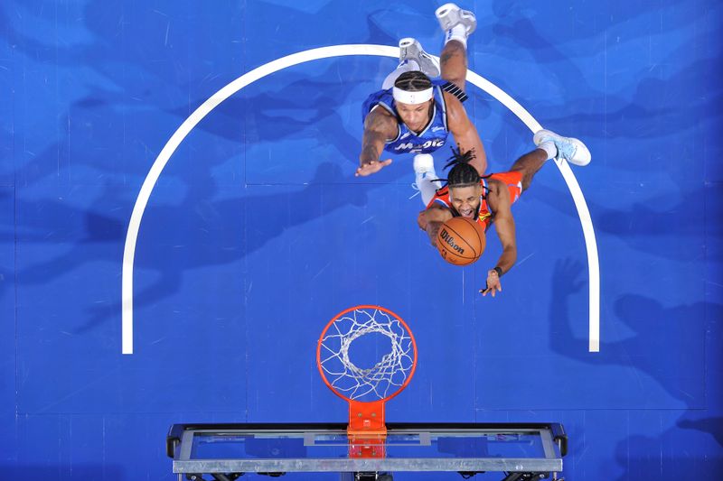 ORLANDO, FL - FEBRUARY 13: Isaiah Joe #11 of the Oklahoma City Thunder shoots the ball during the game against the Orlando Magic on February 13, 2024 at the Kia Center in Orlando, Florida. NOTE TO USER: User expressly acknowledges and agrees that, by downloading and or using this photograph, User is consenting to the terms and conditions of the Getty Images License Agreement. Mandatory Copyright Notice: Copyright 2024 NBAE (Photo by Fernando Medina/NBAE via Getty Images)