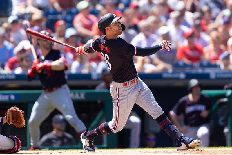 Aug 13, 2023; Philadelphia, Pennsylvania, USA; Minnesota Twins left fielder Jordan Luplow (16) hits a home run during the first inning against the Philadelphia Phillies at Citizens Bank Park. Mandatory Credit: Bill Streicher-USA TODAY Sports