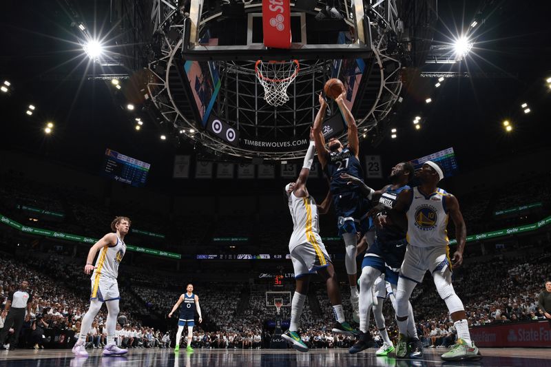 MINNEAPOLIS, MN -  MAY 14: Rudy Gobert #27 of the Minnesota Timberwolves drives to the basket during the game against the Golden State Warriors during Round 2 Game 5 of the 2025 NBA Playoffs on May 14, 2025 at Target Center in Minneapolis, Minnesota. NOTE TO USER: User expressly acknowledges and agrees that, by downloading and or using this Photograph, user is consenting to the terms and conditions of the Getty Images License Agreement. Mandatory Copyright Notice: Copyright 2025 NBAE (Photo by Noah Graham/NBAE via Getty Images)