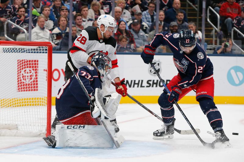 Oct 13, 2025; Columbus, Ohio, USA; Columbus Blue Jackets center Zach Aston-Reese (27) blocks a shot against the New Jersey Devils during the second period at Nationwide Arena. Mandatory Credit: Russell LaBounty-Imagn Images