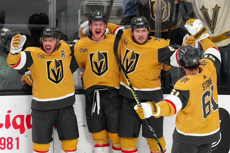 Jan 11, 2024; Las Vegas, Nevada, USA; Vegas Golden Knights center Jack Eichel (9) celebrates with Vegas Golden Knights right wing Jonathan Marchessault (81), Vegas Golden Knights center Ivan Barbashev (49) and Vegas Golden Knights right wing Mark Stone (61) after scoring a goal against the Boston Bruins during the third period at T-Mobile Arena. Mandatory Credit: Stephen R. Sylvanie-USA TODAY Sports