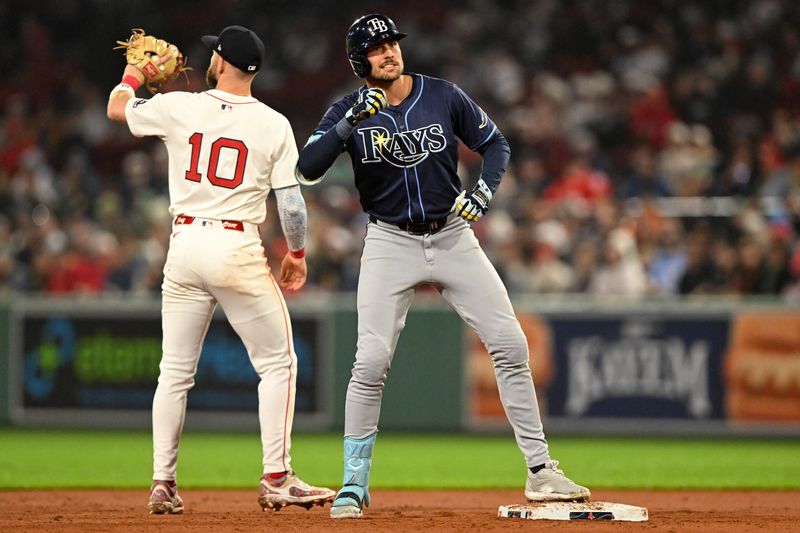Jun 9, 2025; Boston, Massachusetts, USA; Tampa Bay Rays outfielder Josh Lowe (15) reacts after hitting a RBI double against the Boston Red Sox during the seventh inning at Fenway Park. Mandatory Credit: Brian Fluharty-Imagn Images