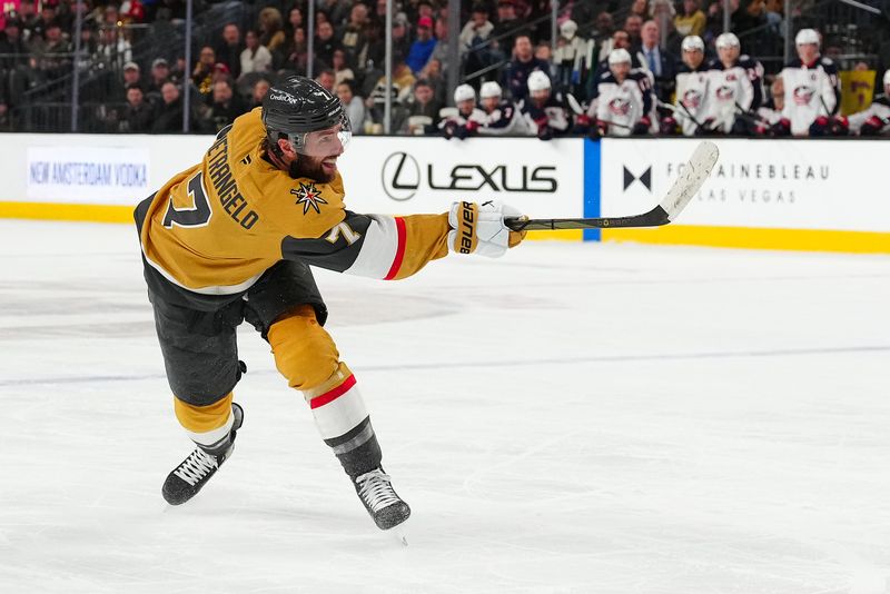 Jan 30, 2025; Las Vegas, Nevada, USA; Vegas Golden Knights defenseman Alex Pietrangelo (7) shoots against the Columbus Blue Jackets during the second period at T-Mobile Arena. Mandatory Credit: Stephen R. Sylvanie-Imagn Images