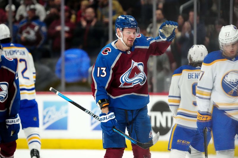 Dec 13, 2023; Denver, Colorado, USA; Colorado Avalanche right wing Valeri Nichushkin (13) celebrates his goal in the first period against the Buffalo Sabres at Ball Arena. Mandatory Credit: Ron Chenoy-USA TODAY Sports