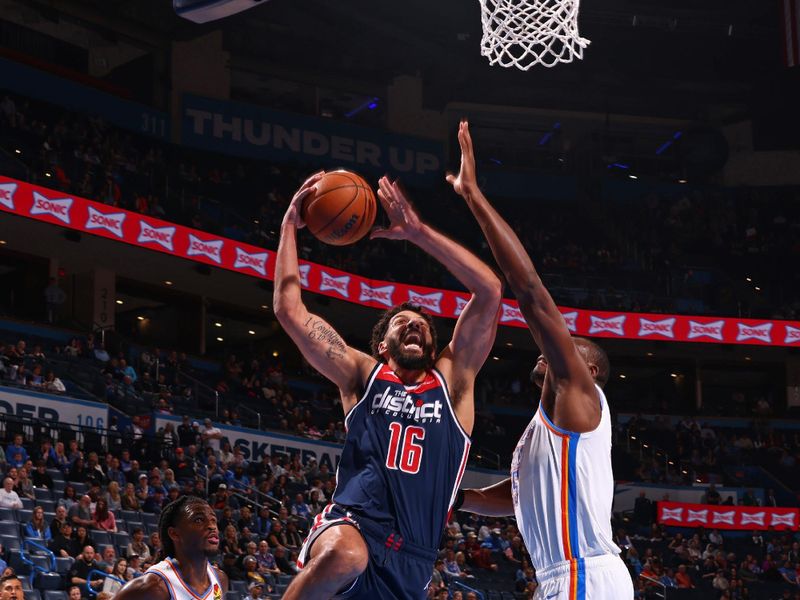 OKLAHOMA CITY, OK - FEBRUARY 23: Anthony Gill #16 of the Washington Wizards drives to the basket during the game against the Oklahoma City Thunder on February 23, 2024 at Paycom Arena in Oklahoma City, Oklahoma. NOTE TO USER: User expressly acknowledges and agrees that, by downloading and or using this photograph, User is consenting to the terms and conditions of the Getty Images License Agreement. Mandatory Copyright Notice: Copyright 2024 NBAE (Photo by Zach Beeker/NBAE via Getty Images)