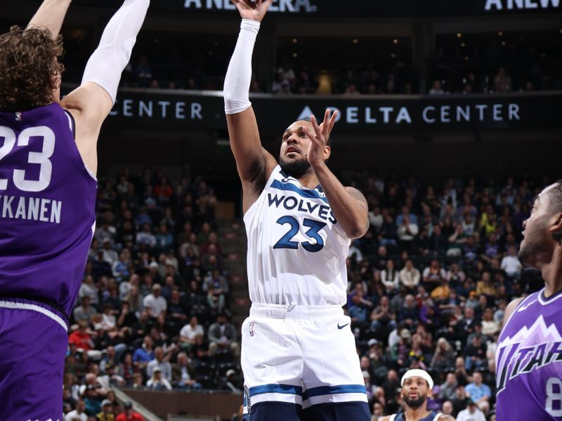 SALT LAKE CITY, UT - MARCH 18: Monte Morris #23 of the Minnesota Timberwolves drives to the basket during the game against the Utah Jazz on March 18, 2024 at Delta Center in Salt Lake City, Utah. NOTE TO USER: User expressly acknowledges and agrees that, by downloading and or using this Photograph, User is consenting to the terms and conditions of the Getty Images License Agreement. Mandatory Copyright Notice: Copyright 2024 NBAE (Photo by Melissa Majchrzak/NBAE via Getty Images)