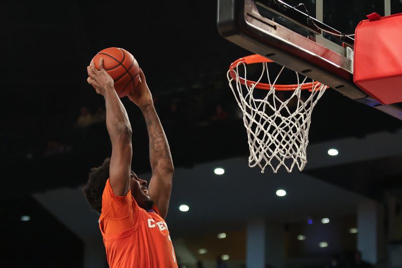 Jan 14, 2025; Atlanta, Georgia, USA; Clemson Tigers forward Chauncey Wiggins (7) dunks the ball against the Georgia Tech Yellow Jackets during the second half at McCamish Pavilion. Mandatory Credit: Jordan Godfree-Imagn Images