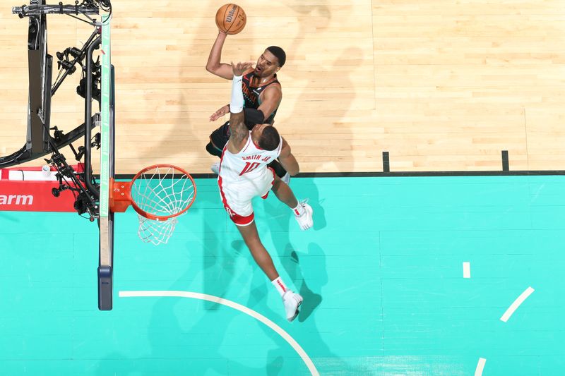 WASHINGTON, DC -? MARCH 19: Jared Butler #4 of the Washington Wizards shoots the ball during the game against the Houston Rockets  on March 19, 2024 at Capital One Arena in Washington, DC. NOTE TO USER: User expressly acknowledges and agrees that, by downloading and or using this Photograph, user is consenting to the terms and conditions of the Getty Images License Agreement. Mandatory Copyright Notice: Copyright 2024 NBAE (Photo by Stephen Gosling/NBAE via Getty Images)