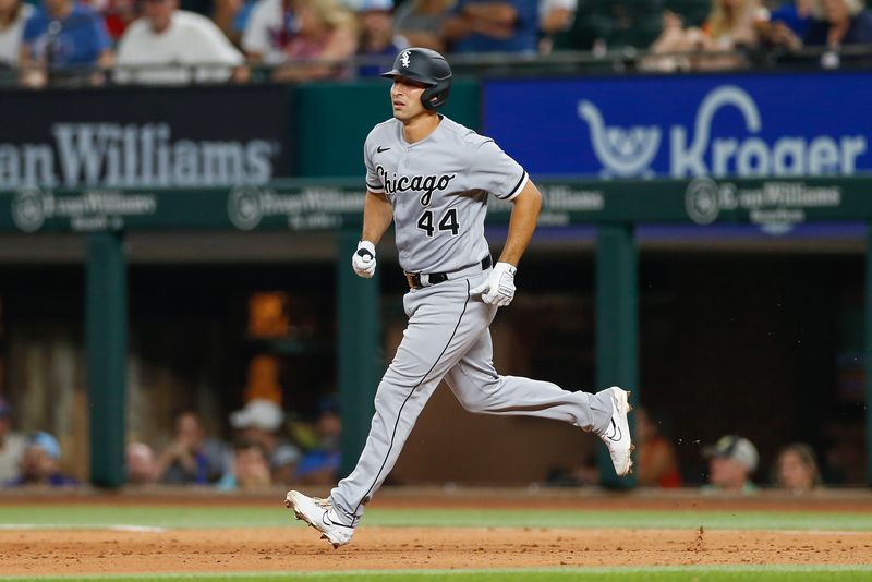 Aug 2, 2023; Arlington, Texas, USA; Chicago White Sox catcher Seby Zavala (44) hits a home run during the eighth inning against the Texas Rangers at Globe Life Field. Mandatory Credit: Andrew Dieb-USA TODAY Sports