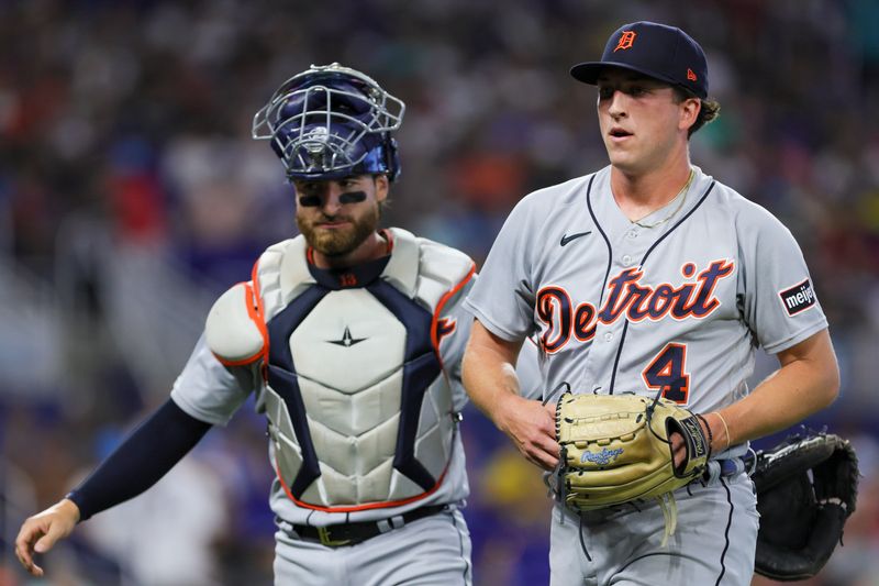 Jul 29, 2023; Miami, Florida, USA; Detroit Tigers starting pitcher Beau Brieske (4) and catcher Eric Haase (13) return to the dugout against the Miami Marlins during the first inning at loanDepot Park. Mandatory Credit: Sam Navarro-USA TODAY Sports