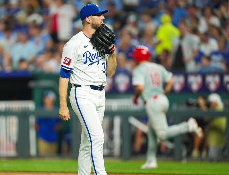 Aug 24, 2024; Kansas City, Missouri, USA; Kansas City Royals relief pitcher Will Smith (31) reacts after giving up a home run to Philadelphia Phillies catcher J.T. Realmuto (10) during the eighth inning at Kauffman Stadium. Mandatory Credit: Jay Biggerstaff-USA TODAY Sports