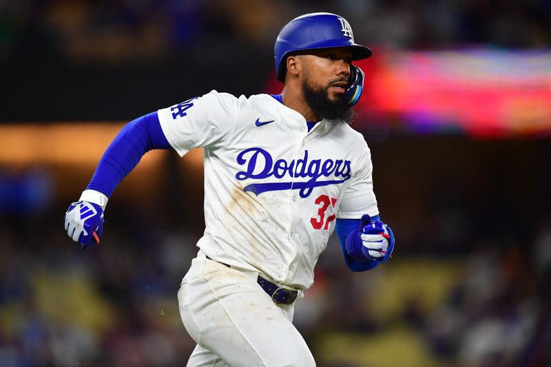 Apr 13, 2024; Los Angeles, California, USA; Los Angeles Dodgers right fielder Teoscar Hernandez (37) runs after hitting a single against the San Diego Padres during the seventh inning at Dodger Stadium. Mandatory Credit: Gary A. Vasquez-USA TODAY Sports