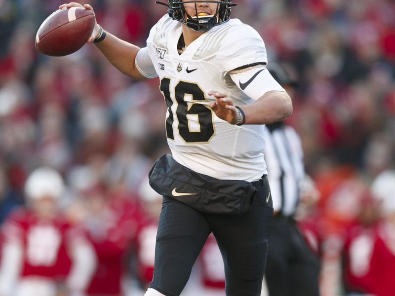 Nov 23, 2019; Madison, WI, USA; Purdue Boilermakers quarterback Aidan O'Connell (16) throws a pass during the first quarter against the Wisconsin Badgers at Camp Randall Stadium. Mandatory Credit: Jeff Hanisch-USA TODAY Sports