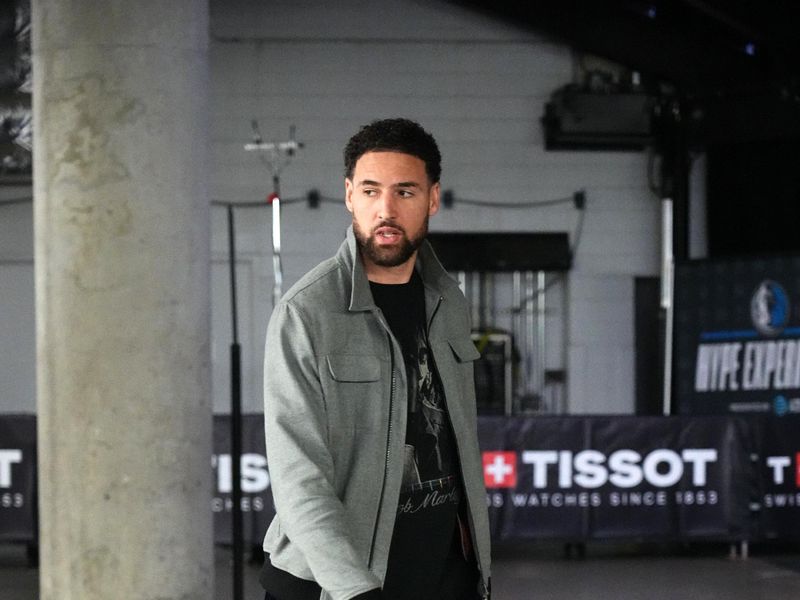 DALLAS, TX - MARCH 13: Klay Thompson #11 of the Golden State Warriors arrives to the arena before the game against the Dallas Mavericks on March 13, 2024 at the American Airlines Center in Dallas, Texas. NOTE TO USER: User expressly acknowledges and agrees that, by downloading and or using this photograph, User is consenting to the terms and conditions of the Getty Images License Agreement. Mandatory Copyright Notice: Copyright 2024 NBAE (Photo by Glenn James/NBAE via Getty Images)