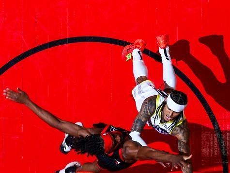 TORONTO, CANADA - DECEMBER 23:  Jordan Clarkson #00 of the Utah Jazz drives to the basket during the game against the Toronto Raptors on December 23, 2023 at the Scotiabank Arena in Toronto, Ontario, Canada.  NOTE TO USER: User expressly acknowledges and agrees that, by downloading and or using this Photograph, user is consenting to the terms and conditions of the Getty Images License Agreement.  Mandatory Copyright Notice: Copyright 2023 NBAE (Photo by Vaughn Ridley/NBAE via Getty Images)