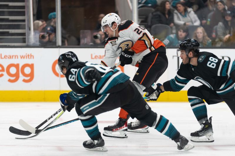 Feb 29, 2024; San Jose, California, USA; Anaheim Ducks right wing Brett Leason (20) shoots the puck and scores during the first period against the San Jose Sharks at SAP Center at San Jose. Mandatory Credit: Stan Szeto-USA TODAY Sports