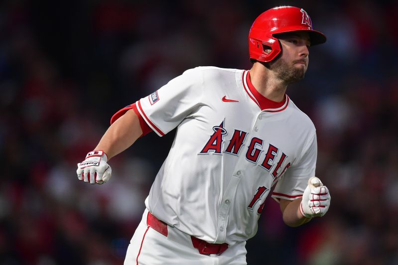 Apr 23, 2024; Anaheim, California, USA; Los Angeles Angels first baseman Nolan Schanuel (18) runs after hitting an RBI single against the Baltimore Orioles during the fourth inning at Angel Stadium. Mandatory Credit: Gary A. Vasquez-USA TODAY Sports