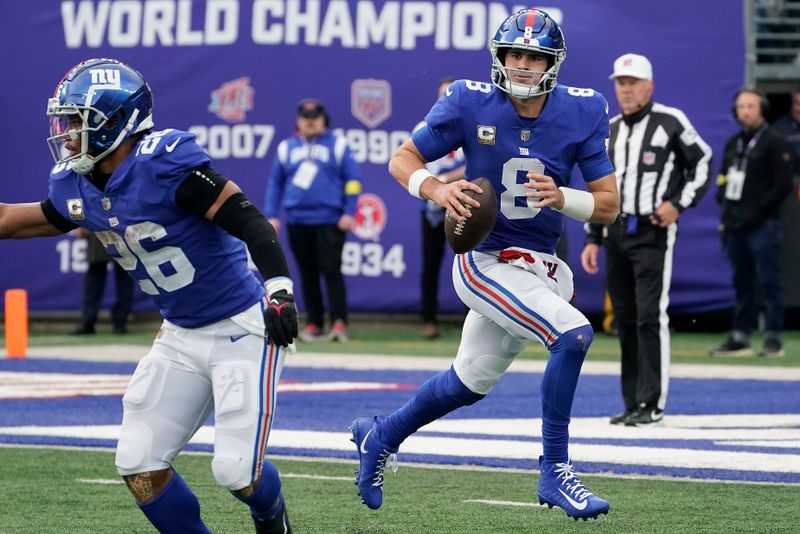 New York Giants quarterback Daniel Jones (8) looks to pass against the Houston Texans during the second quarter of an NFL football game, Sunday, Nov. 13, 2022, in East Rutherford, N.J. (AP Photo/John Minchillo)