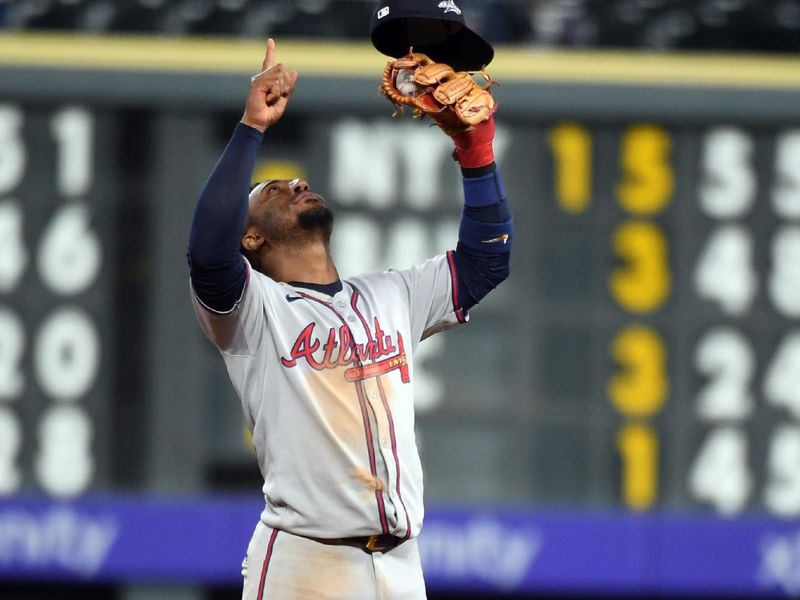 Apr 29, 2025; Denver, Colorado, USA; Atlanta Braves second base Ozzie Albies (1) celebrates after a win against the Colorado Rockies at Coors Field. Mandatory Credit: Christopher Hanewinckel-Imagn Images