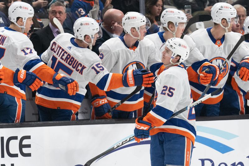 Mar 7, 2024; San Jose, California, USA; New York Islanders defenseman Sebastian Aho (25) celebrates with his teammates during the second period against the San Jose Sharks at SAP Center at San Jose. Mandatory Credit: Stan Szeto-USA TODAY Sports