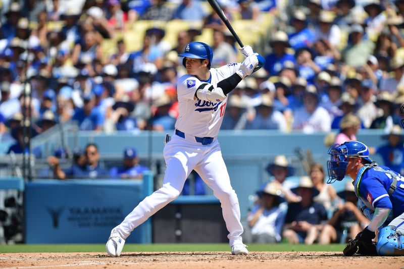 Jun 16, 2024; Los Angeles, California, USA; Los Angeles Dodgers designated hitter Shohei Ohtani (17) hits against the Kansas City Royals during the seventh inning at Dodger Stadium. Mandatory Credit: Gary A. Vasquez-USA TODAY Sports
