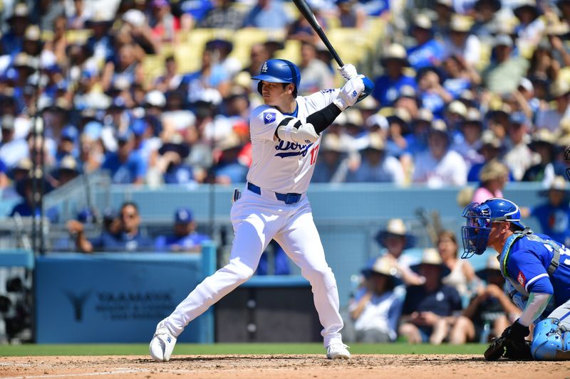 Jun 16, 2024; Los Angeles, California, USA; Los Angeles Dodgers designated hitter Shohei Ohtani (17) hits against the Kansas City Royals during the seventh inning at Dodger Stadium. Mandatory Credit: Gary A. Vasquez-USA TODAY Sports