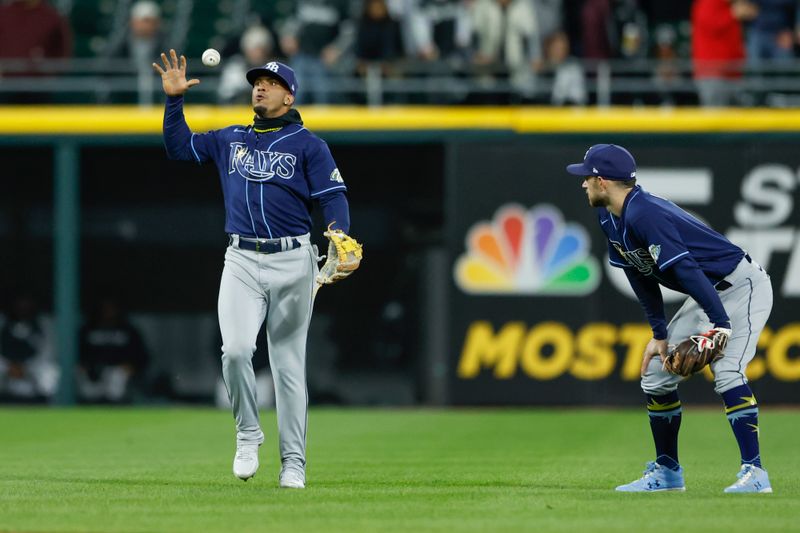 Apr 28, 2023; Chicago, Illinois, USA; Tampa Bay Rays shortstop Wander Franco (5) celebrates after catching a fly ball hit by Chicago White Sox center fielder Luis Robert Jr. (not pictured) for a final out during the ninth inning at Guaranteed Rate Field. Mandatory Credit: Kamil Krzaczynski-USA TODAY Sports