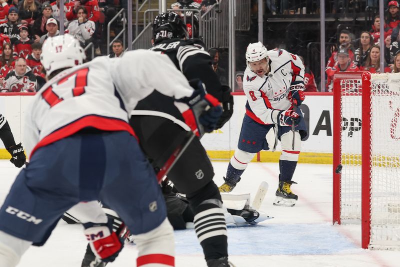 Dec 27, 2025; Newark, New Jersey, USA; Washington Capitals left wing Alex Ovechkin (8) scores a goal against the New Jersey Devils during the third period at Prudential Center. Mandatory Credit: Ed Mulholland-Imagn Images