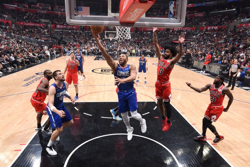 LOS ANGELES, CA - MARCH 27: Eric Gordon #10 of the LA Clippers drives to the basket during the game against the Chicago Bulls on March 27, 2023 at Crypto.Com Arena in Los Angeles, California. NOTE TO USER: User expressly acknowledges and agrees that, by downloading and/or using this Photograph, user is consenting to the terms and conditions of the Getty Images License Agreement. Mandatory Copyright Notice: Copyright 2023 NBAE (Photo by Adam Pantozzi/NBAE via Getty Images)