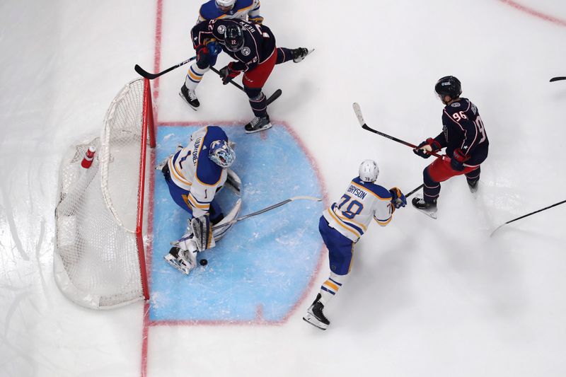 Feb 23, 2024; Columbus, Ohio, USA; Buffalo Sabres goalie Ukko-Pekka Luukkonen (1) makes a pad save against the Columbus Blue Jackets during the first period at Nationwide Arena. Mandatory Credit: Russell LaBounty-USA TODAY Sports