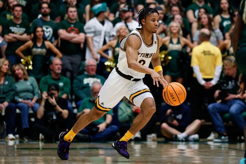 Mar 2, 2024; Fort Collins, Colorado, USA; Wyoming Cowboys guard Sam Griffin (3) dribbles the ball up court in the second half against the Colorado State Rams at Moby Arena. Mandatory Credit: Isaiah J. Downing-USA TODAY Sports