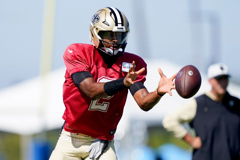 New Orleans Saints quarterback Jameis Winston takes a snap during a joint NFL football practice with the Los Angeles Chargers, Thursday, Aug. 17, 2023, in Costa Mesa, Calif. (AP Photo/Ryan Sun)