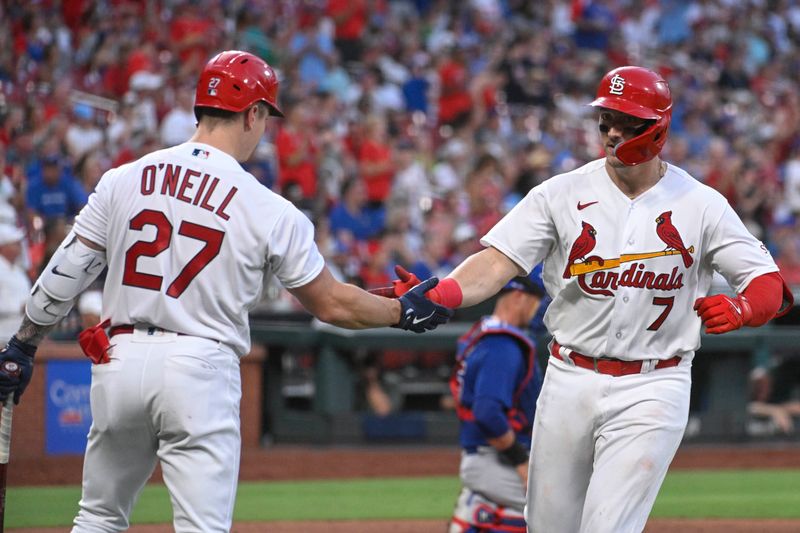 Jul 27, 2023; St. Louis, Missouri, USA; St. Louis Cardinals catcher Andrew Knizner (7) is congratulated by left fielder Tyler O'Neill (27) after Knizner hits a solo home run against the Chicago Cubs in the fourth inning at Busch Stadium. Mandatory Credit: Joe Puetz-USA TODAY Sports