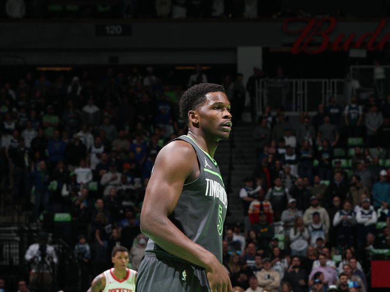 MINNEAPOLIS, MN -  NOVEMBER 26: Anthony Edwards #5 of the Minnesota Timberwolves looks on during the game against the Houston Rockets during the Emirates NBA Cup game on November 26, 2024 at Target Center in Minneapolis, Minnesota. NOTE TO USER: User expressly acknowledges and agrees that, by downloading and or using this Photograph, user is consenting to the terms and conditions of the Getty Images License Agreement. Mandatory Copyright Notice: Copyright 2024 NBAE (Photo by David Sherman/NBAE via Getty Images)