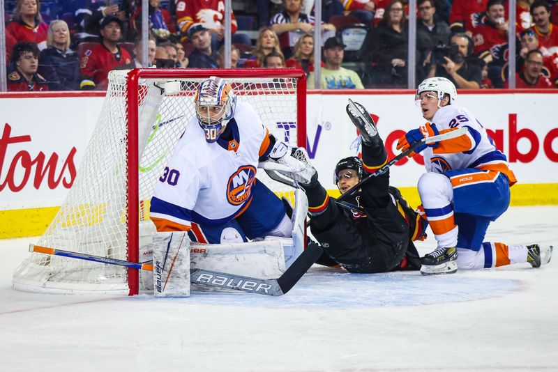 Nov 18, 2023; Calgary, Alberta, CAN; New York Islanders goaltender Ilya Sorokin (30) guards his net against the Calgary Flames during the second period at Scotiabank Saddledome. Mandatory Credit: Sergei Belski-USA TODAY Sports