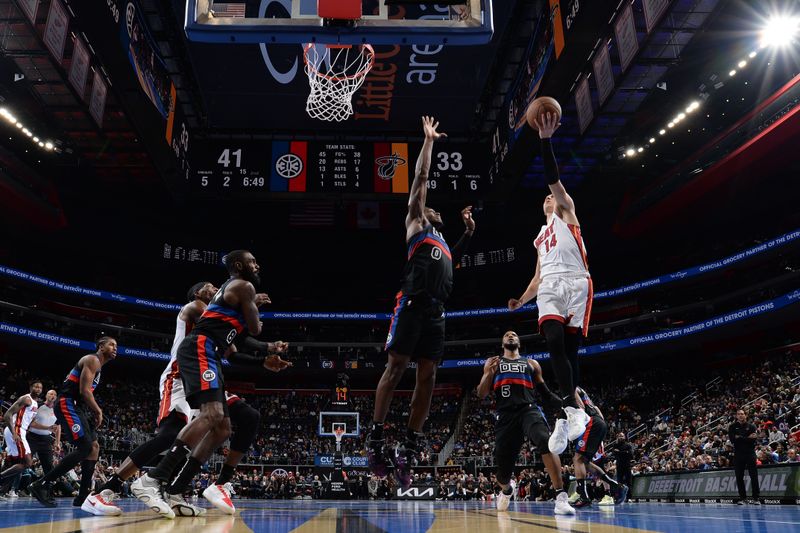 DETROIT, MI - NOVEMBER 12: Tyler Herro #14 of the Miami Heat drives to the basket during the game against the Detroit Pistons during the Emirates NBA Cup game on November 12, 2024 at Little Caesars Arena in Detroit, Michigan. NOTE TO USER: User expressly acknowledges and agrees that, by downloading and/or using this photograph, User is consenting to the terms and conditions of the Getty Images License Agreement. Mandatory Copyright Notice: Copyright 2024 NBAE (Photo by Chris Schwegler/NBAE via Getty Images)