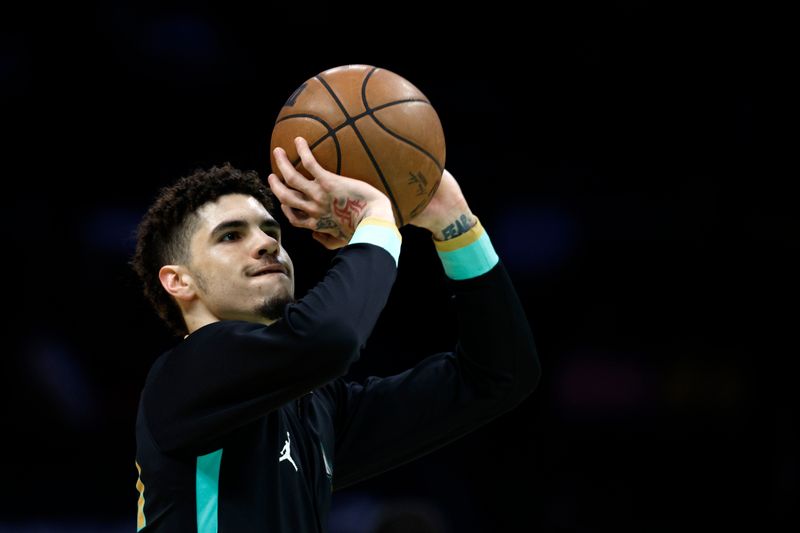 CHARLOTTE, NORTH CAROLINA - JANUARY 02: LaMelo Ball #1 of the Charlotte Hornets warms up prior to the first quarter of the game against the Los Angeles Lakers at Spectrum Center on January 02, 2023 in Charlotte, North Carolina. NOTE TO USER: User expressly acknowledges and agrees that, by downloading and or using this photograph, User is consenting to the terms and conditions of the Getty Images License Agreement. (Photo by Jared C. Tilton/Getty Images)