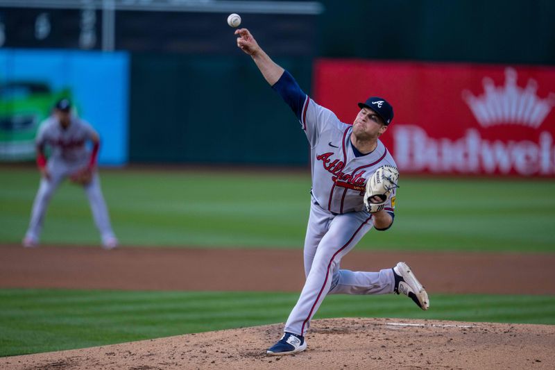 May 30, 2023; Oakland, California, USA;  Atlanta Braves starting pitcher Bryce Elder (55) delivers a pitch against the Oakland Athletics during the first inning at Oakland-Alameda County Coliseum. Mandatory Credit: Neville E. Guard-USA TODAY Sports