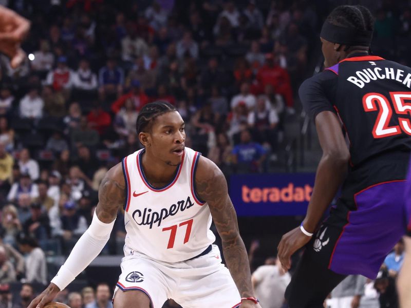 INGLEWOOD, CA - NOVEMBER 9: Kevin Porter Jr. #77 of the LA Clippers dribbles the ball during the game against the Toronto Raptors on November 9, 2024 at Intuit Dome in Los Angeles, California. NOTE TO USER: User expressly acknowledges and agrees that, by downloading and/or using this Photograph, user is consenting to the terms and conditions of the Getty Images License Agreement. Mandatory Copyright Notice: Copyright 2024 NBAE (Photo by Jessie Alcheh/NBAE via Getty Images)