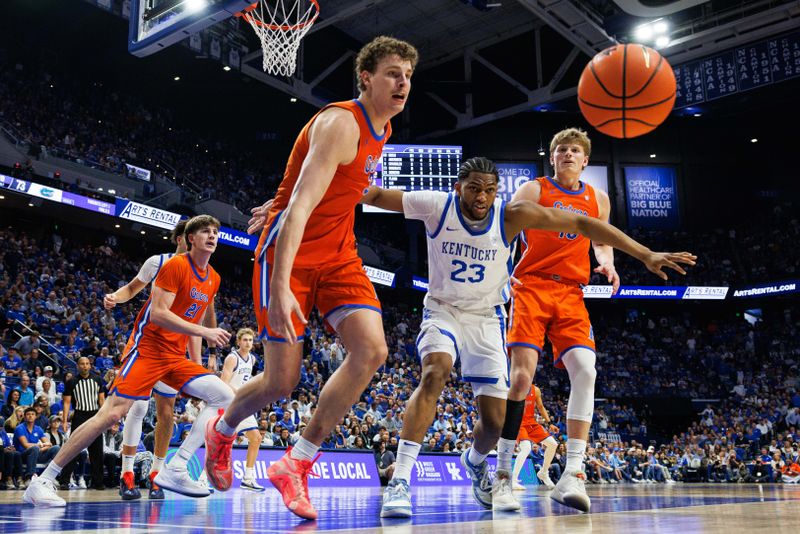 Mar 7, 2026; Lexington, Kentucky, USA; Florida Gators center Micah Handlogten (3) and Kentucky Wildcats forward Mouhamed Dioubate (23) go after the ball during the second half at Rupp Arena at Central Bank Center. Mandatory Credit: Jordan Prather-Imagn Images