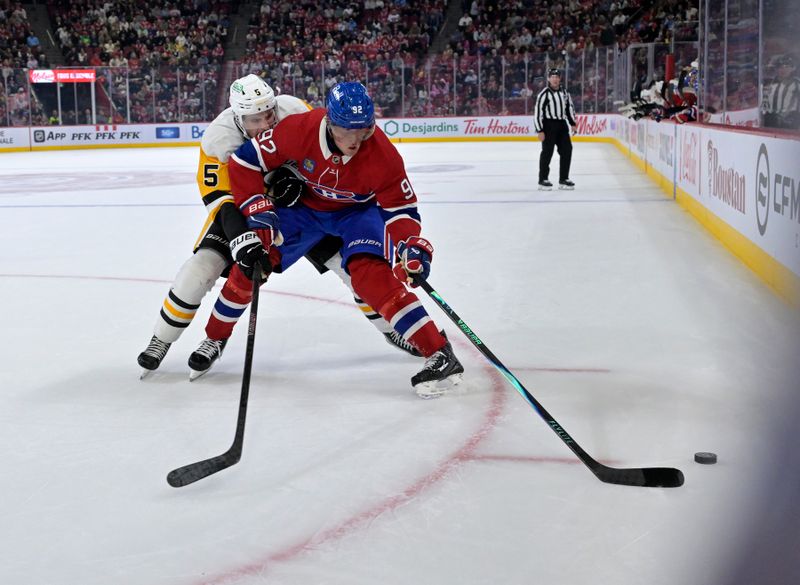 Sep 22, 2025; Montreal, Quebec, CAN;Montreal Canadiens forward Patrik Laine (92) plays the puck and Pittsburgh Penguins defenseman Ryan Shea (5) defends during the second period at the Bell Centre. Mandatory Credit: Eric Bolte-Imagn Images