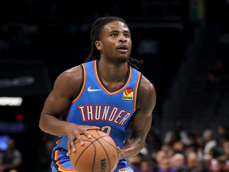 CHARLOTTE, NC - OCTOBER 15: Cason Wallace #22 of the Oklahoma City Thunder shoots the ball during the game against the Charlotte Hornets on October 15, 2023 at Spectrum Center in Charlotte, North Carolina. NOTE TO USER: User expressly acknowledges and agrees that, by downloading and or using this photograph, User is consenting to the terms and conditions of the Getty Images License Agreement.  Mandatory Copyright Notice:  Copyright 2023 NBAE (Photo by Brock Williams-Smith/NBAE via Getty Images)