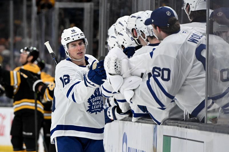 Feb 25, 2025; Boston, Massachusetts, USA; Toronto Maple Leafs right wing Mitch Marner (16) celebrates with his teammates after scoring a goal against the Boston Bruins during the third period at the TD Garden. Mandatory Credit: Brian Fluharty-Imagn Images