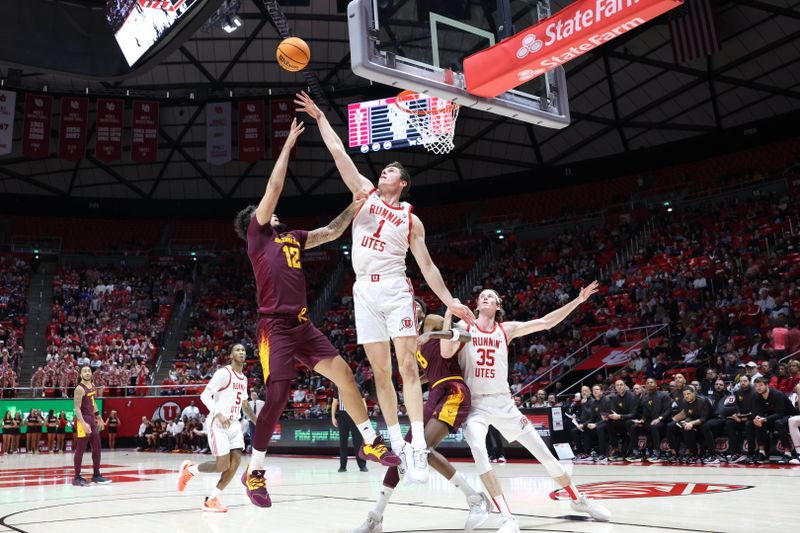 Feb 10, 2024; Salt Lake City, Utah, USA; Arizona State Sun Devils guard Jose Perez (12) shoots over Utah Utes forward Ben Carlson (1) during the first half at Jon M. Huntsman Center. Mandatory Credit: Rob Gray-USA TODAY Sports