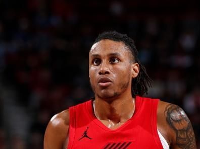 PORTLAND, OR - DECEMBER 26: Jabari Walker #34 of the Portland Trail Blazers prepares to shoot a free throw during the game against the Sacramento Kings on December 26, 2023 at the Moda Center Arena in Portland, Oregon. NOTE TO USER: User expressly acknowledges and agrees that, by downloading and or using this photograph, user is consenting to the terms and conditions of the Getty Images License Agreement. Mandatory Copyright Notice: Copyright 2023 NBAE (Photo by Cameron Browne/NBAE via Getty Images)