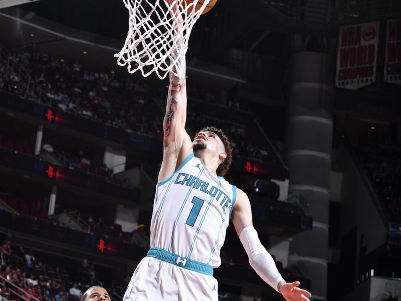 HOUSTON, TX - OCTOBER 23: LaMelo Ball #1 of the Charlotte Hornets drives to the basket during the game against the Houston Rockets during a regular season game on October 23, 2024 at the Toyota Center in Houston, Texas. NOTE TO USER: User expressly acknowledges and agrees that, by downloading and or using this photograph, User is consenting to the terms and conditions of the Getty Images License Agreement. Mandatory Copyright Notice: Copyright 2024 NBAE (Photo by Logan Riely/NBAE via Getty Images)