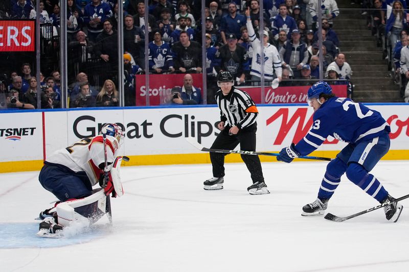 May 5, 2025; Toronto, Ontario, CAN; Toronto Maple Leafs forward Matthew Knies (23) scores against Florida Panthers goaltender Sergei Bobrovsky (72) during the third period of game one of the second round of the 2025 Stanley Cup Playoffs at Scotiabank Arena. Mandatory Credit: John E. Sokolowski-Imagn Images