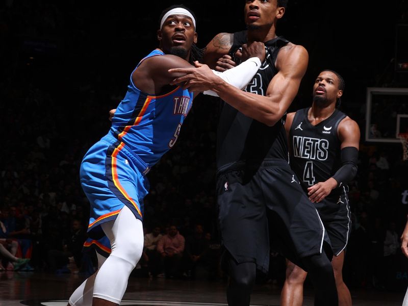 BROOKLYN, NY - JANUARY 5: Luguentz Dort #5 of the Oklahoma City Thunder boxes out during the game  against Nicolas Claxton #33 of the Brooklyn Nets on January 5, 2024 at Barclays Center in Brooklyn, New York. NOTE TO USER: User expressly acknowledges and agrees that, by downloading and or using this Photograph, user is consenting to the terms and conditions of the Getty Images License Agreement. Mandatory Copyright Notice: Copyright 2024 NBAE (Photo by Nathaniel S. Butler/NBAE via Getty Images)