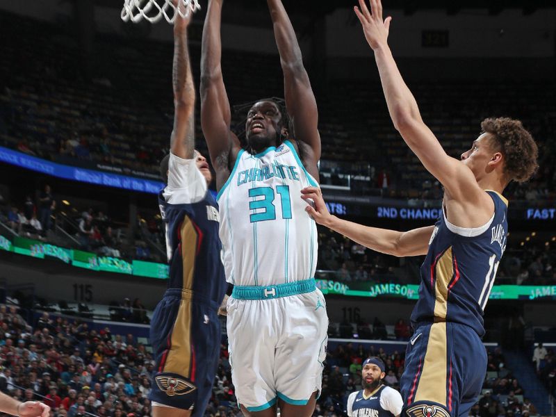 NEW ORLEANS, LA - JANUARY 17: Nathan Mensah #31 of the Charlotte Hornets  shoots the ball during the game against the New Orleans Pelicans on January 17, 2024 at the Smoothie King Center in New Orleans, Louisiana. NOTE TO USER: User expressly acknowledges and agrees that, by downloading and or using this Photograph, user is consenting to the terms and conditions of the Getty Images License Agreement. Mandatory Copyright Notice: Copyright 2024 NBAE (Photo by Layne Murdoch Jr./NBAE via Getty Images)