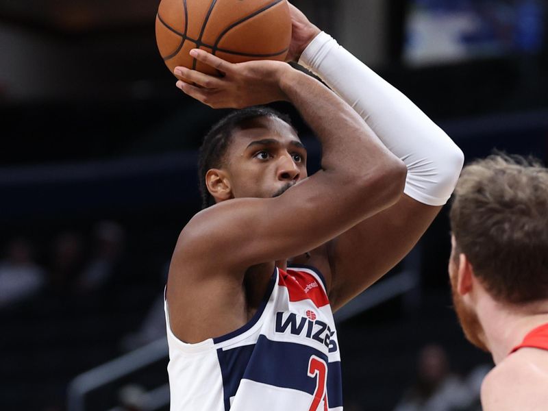 WASHINGTON, DC - OCTOBER 11: Alex Sarr #20 of the Washington Wizards shoots the ball against the Toronto Raptors during the first half of a preseason game at Capital One Arena on October 11, 2024 in Washington, DC. NOTE TO USER: User expressly acknowledges and agrees that, by downloading and or using this photograph, User is consenting to the terms and conditions of the Getty Images License Agreement. (Photo by Patrick Smith/Getty Images)